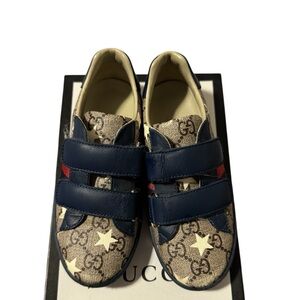Gucci monogram sneakers with stars